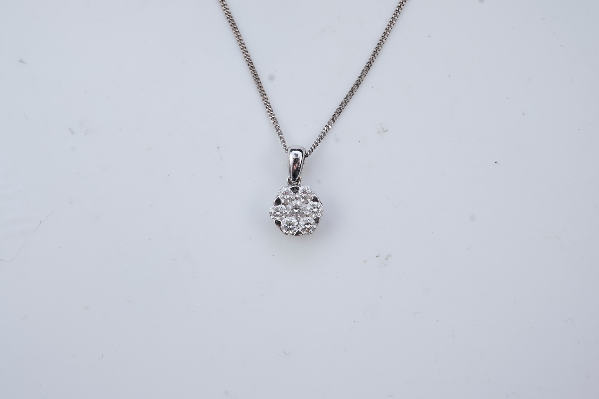 A diamond pendant necklace